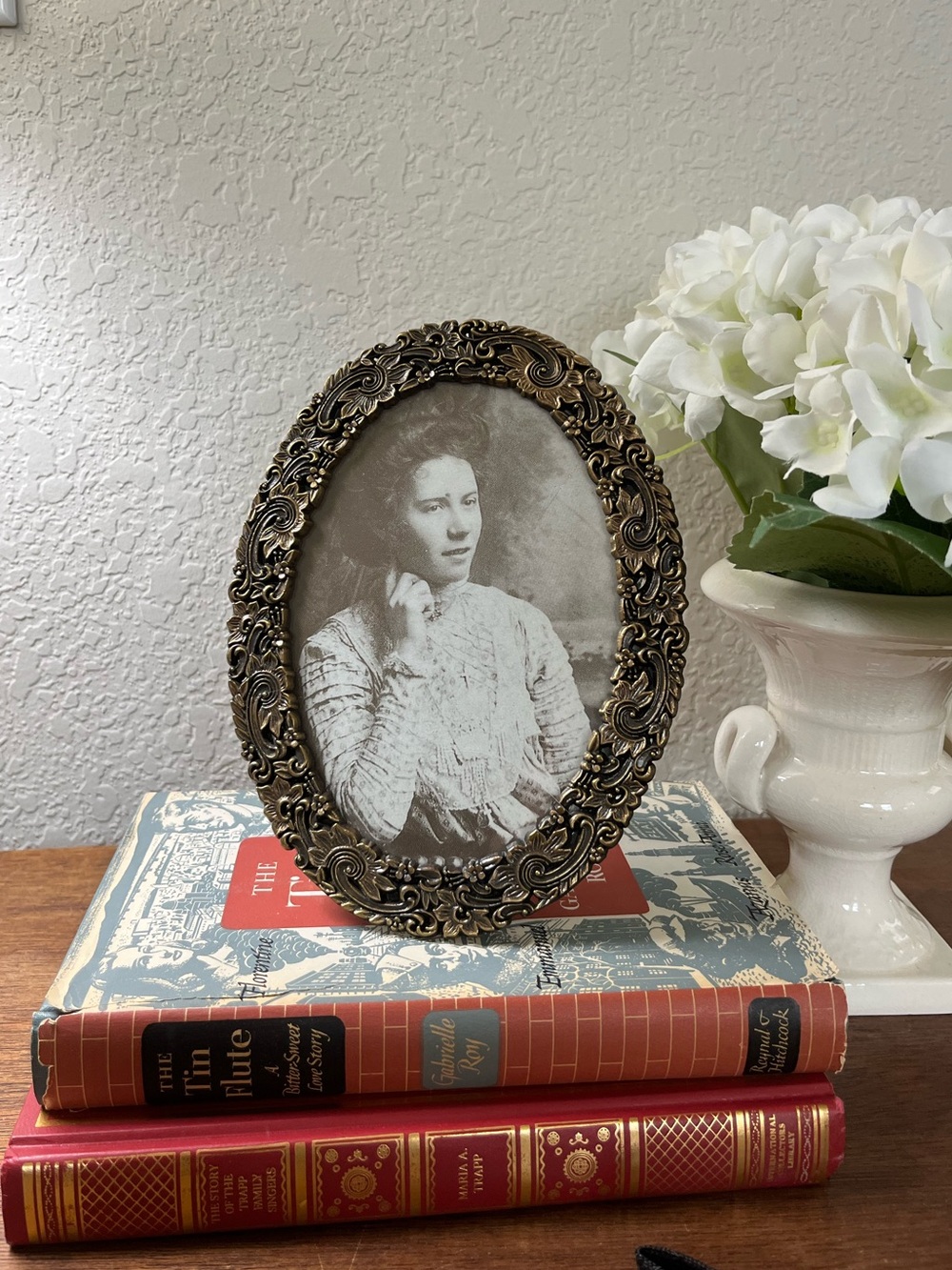 Vintage brass frame with black and white portrait